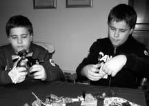 AIDS ANGELS: Many volunteershave been creating African AIDS Angels to sell for Christmas. Two of them are Assumption Youth Group members Alex and John MacDonald. The money raised from the sale of these angels is used to support projects in Africa including a hospital, an orphanage and a school. African AIDS Angels can be purchased at Paperworks Gift Gallery, Rainbow Valley and Breakwater Books.